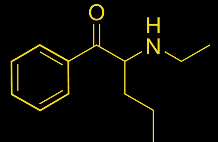 Molécula de NEP en amarillo sobre fondo negro